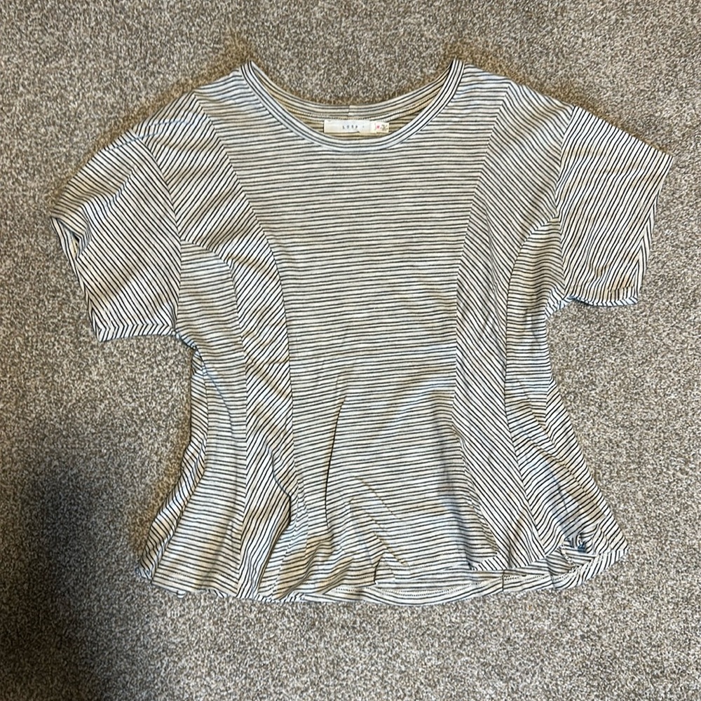 Fitted with flare at bottom crop top shirt size medium. Like new